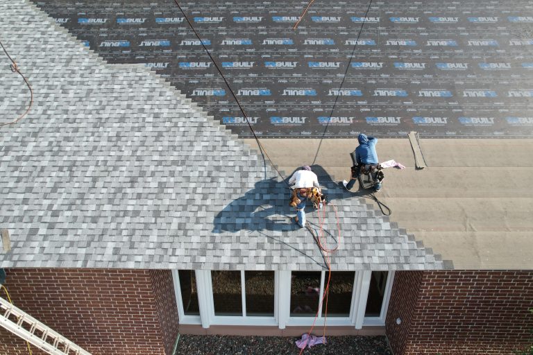Roofers working on a project
